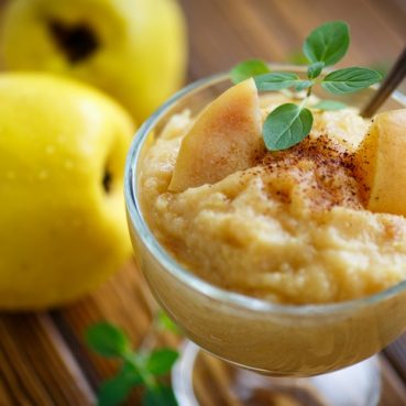 mashed cooked sweet quince with cinnamon and mint
