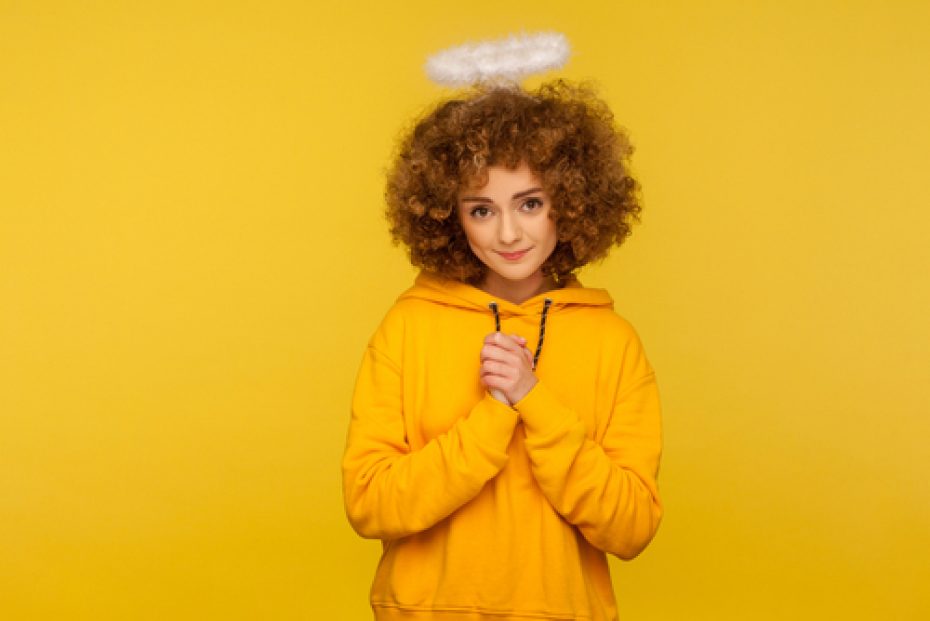 Portrait,Of,Kind,Lovely,Curly-haired,Hipster,Woman,With,Saint,Nimbus